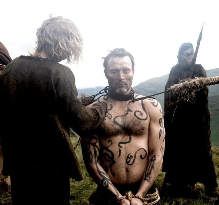 One-Eye imprisoned by a group of men in Valhalla Rising.