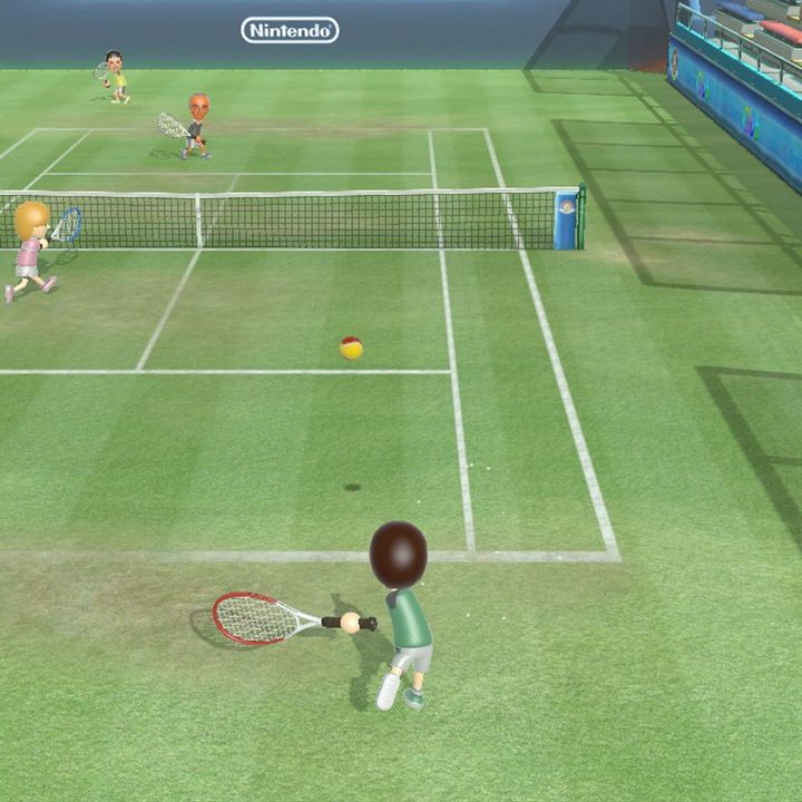 Four people play Tennis in Wii Sports Club