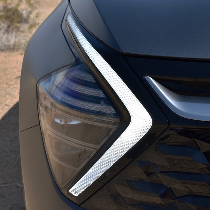 Headlight and daytime running light on the 2023 Kia Sportage Hybrid.
