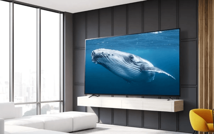 The 82-inch LG UP8770 4K TV in a living room.