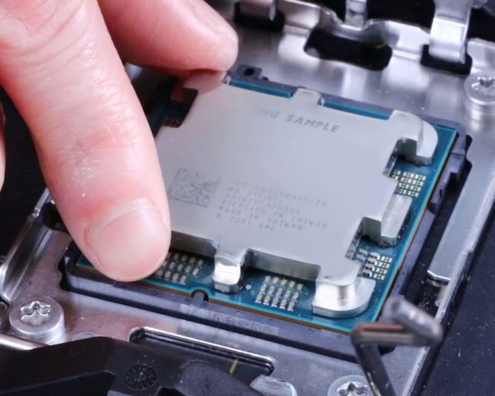 AMD Ryzen 7000 processor being installed inside a MSI motherboard.