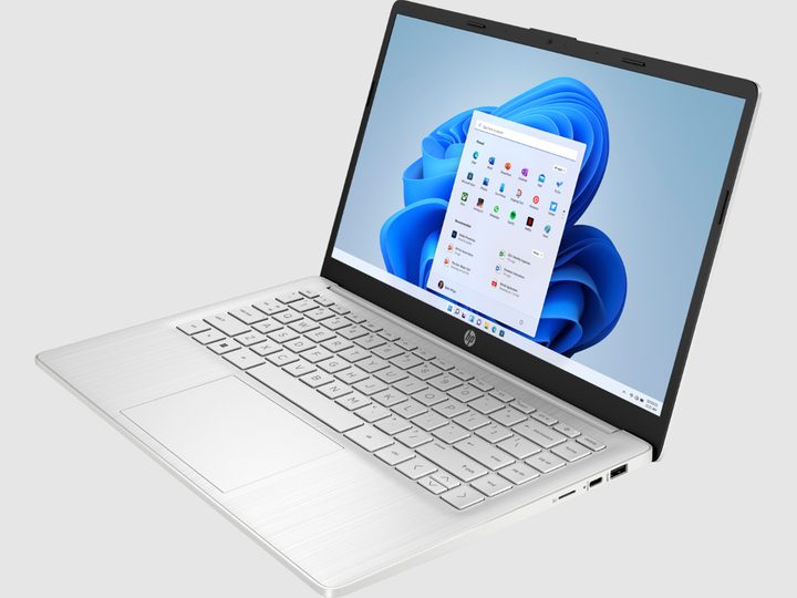 The HP Laptop 14 on a light grey background.