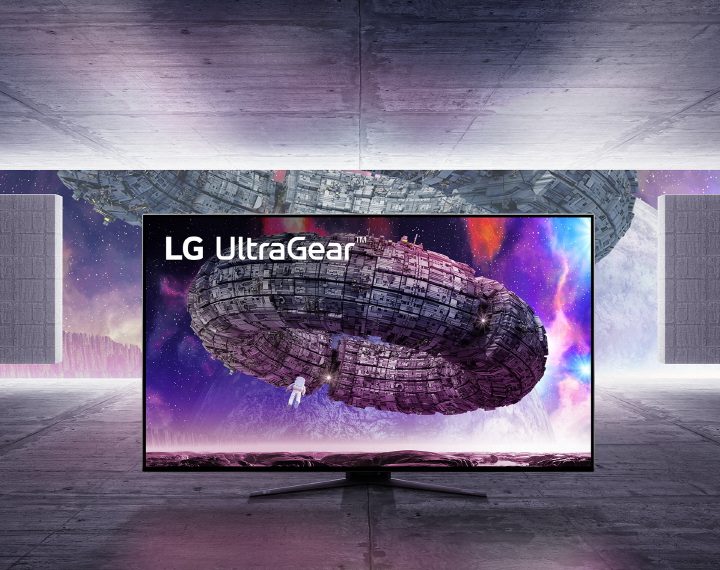 LG UltraGear monitor over a futuristic background.