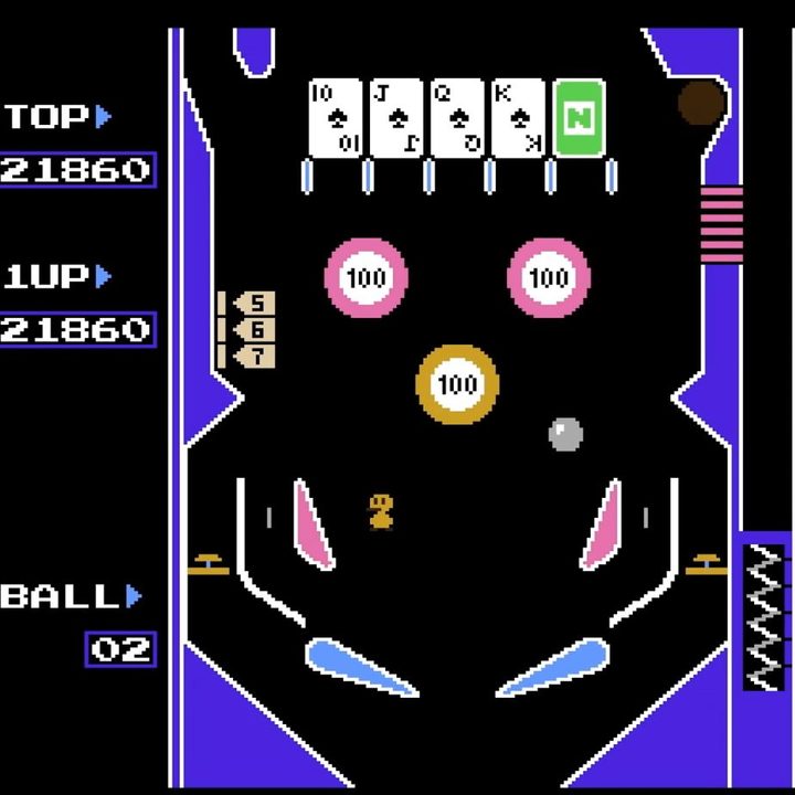A ball is hit by a paddle in Pinball for NES on Nintendo Switch Online.