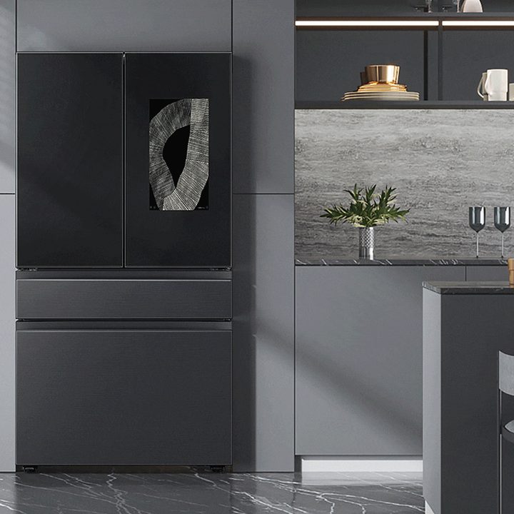 Samsung Bespoke 4-door French door Family Hub refrigerator in a dark-gray kitchen.