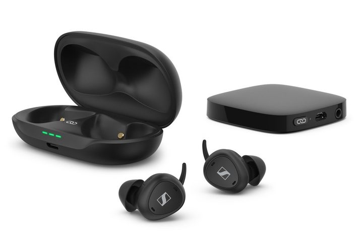 Sennheiser TV Clear earbuds with charging case and TV transmitter.