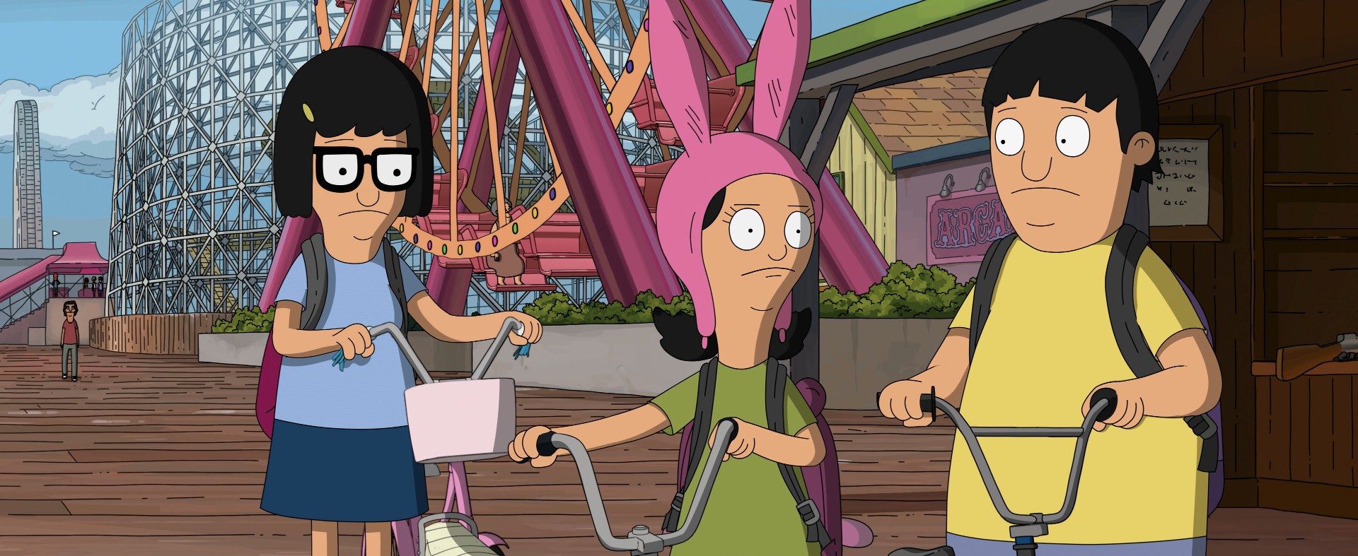 Tina, Louise, and Gene wander the wharf.