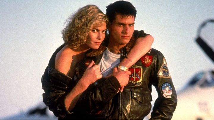 Charlie and Maverick embracing in Top Gun.
