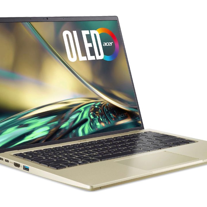 The Acer Swift 3 OLED opened up and against a white background.