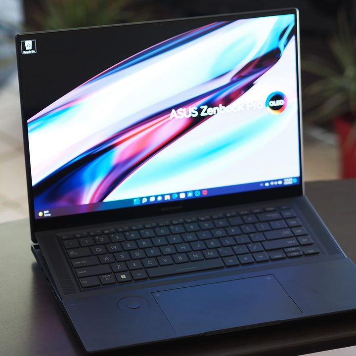 A Asus Zenbook Pro 16X sitting on a desk.