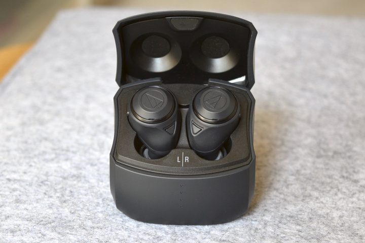 Audio-Technica ATH-CKS50TW wireless earbuds seen inside their case.