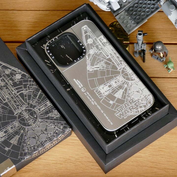 Casetify's metal Millennium Falcon iPhone case with its box.