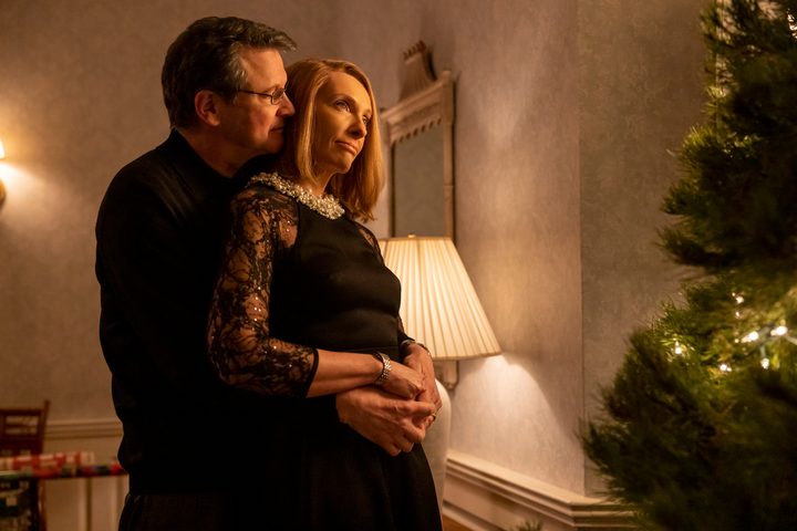 Colin Firth wraps his arms around Toni Collette in The Staircase.