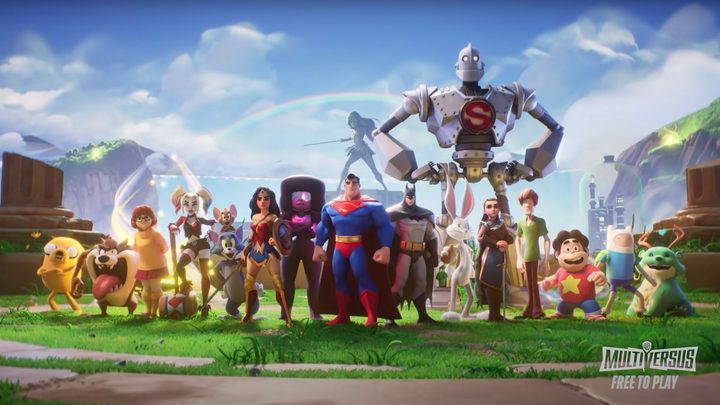 A large group of DC and Warner Bros characters stand together in MultiVersus.