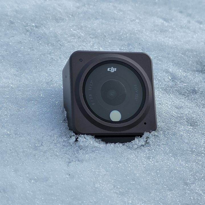 The DJI Action 2 in a snow bank.