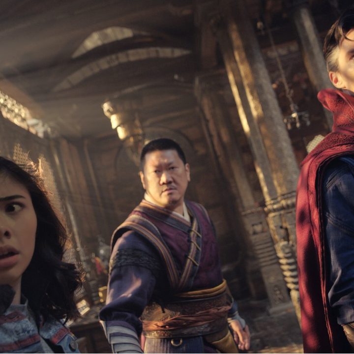 Xochitl Gomez, Benedict Wong, and Benedict Cumberbatch stare into the camera in a scene from Doctor Strange in the Multiverse of Madness.