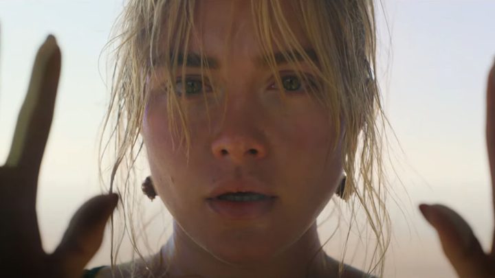 Close-up of a young woman looking confused in the 2022 movie "Don't Worry Darling."