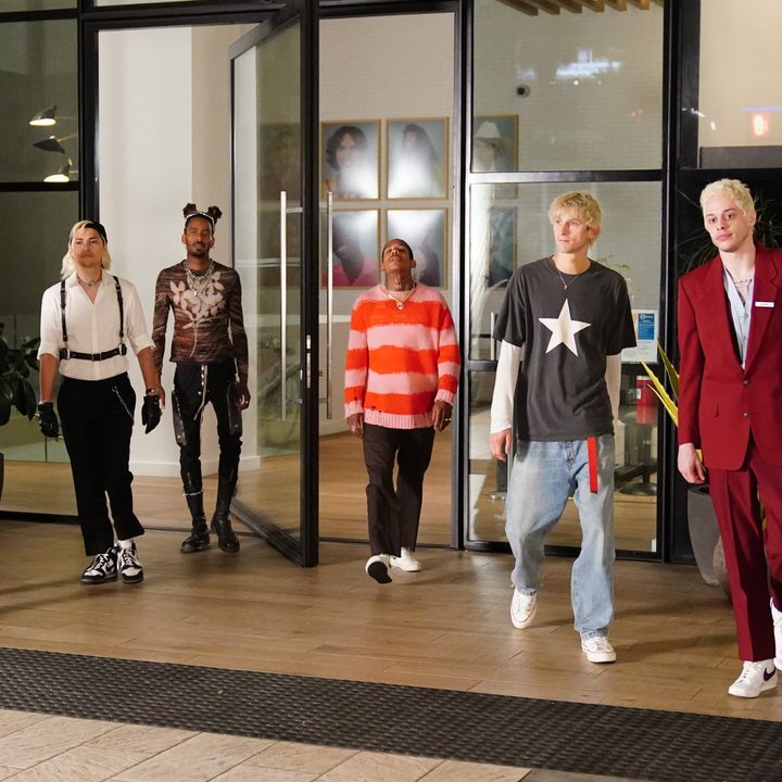 Mod Sun, Zach Villa, GaTa, Boo Johnson, Machine Gun Kelly, and Pete Davidson walking in a scene from Good Mourning
