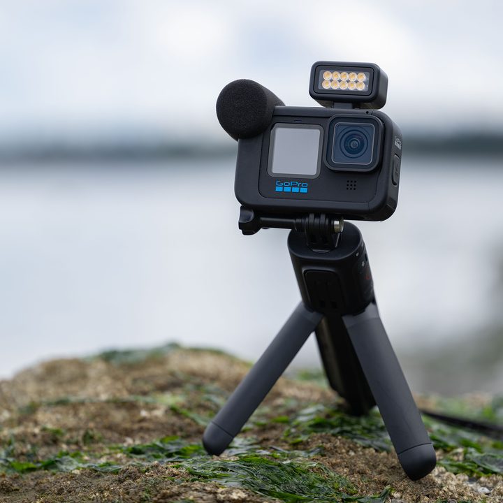 The GoPro Hero 10 Creator Edition on a rock.
