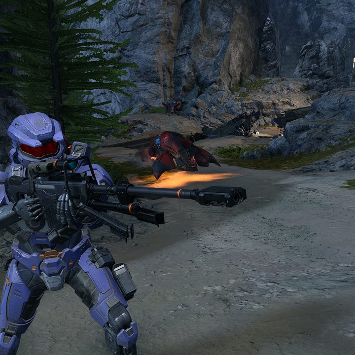 A Spartan lines up a shot with a sniper rifle in Halo Infinite.