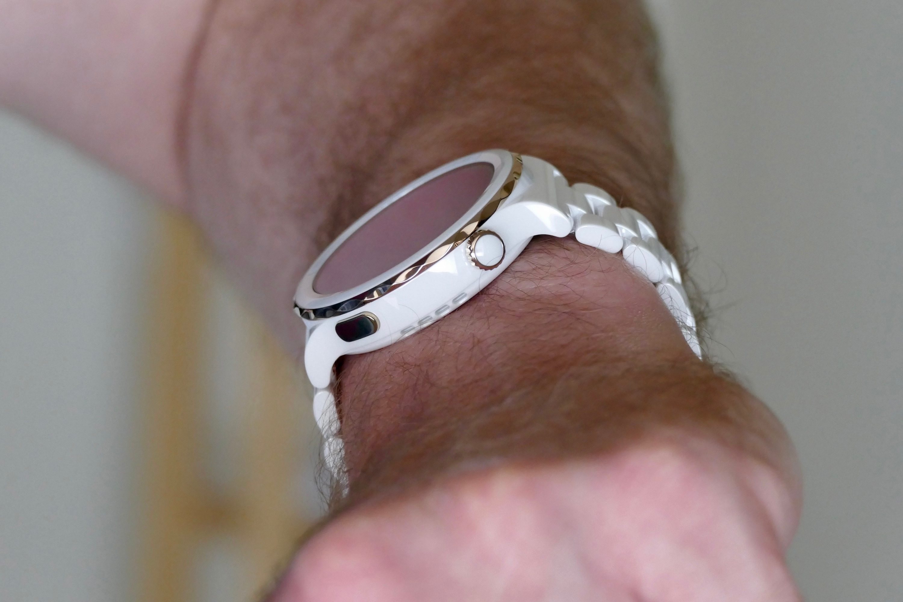 Huawei Watch GT 3 Pro seen from the side on a wrist.