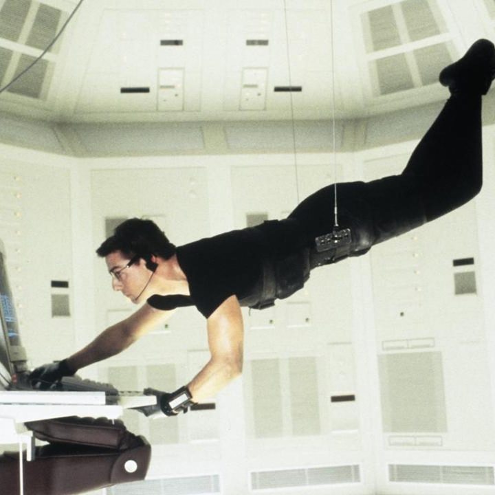 Tom Cruise stars in Mission: Impossible (1996).