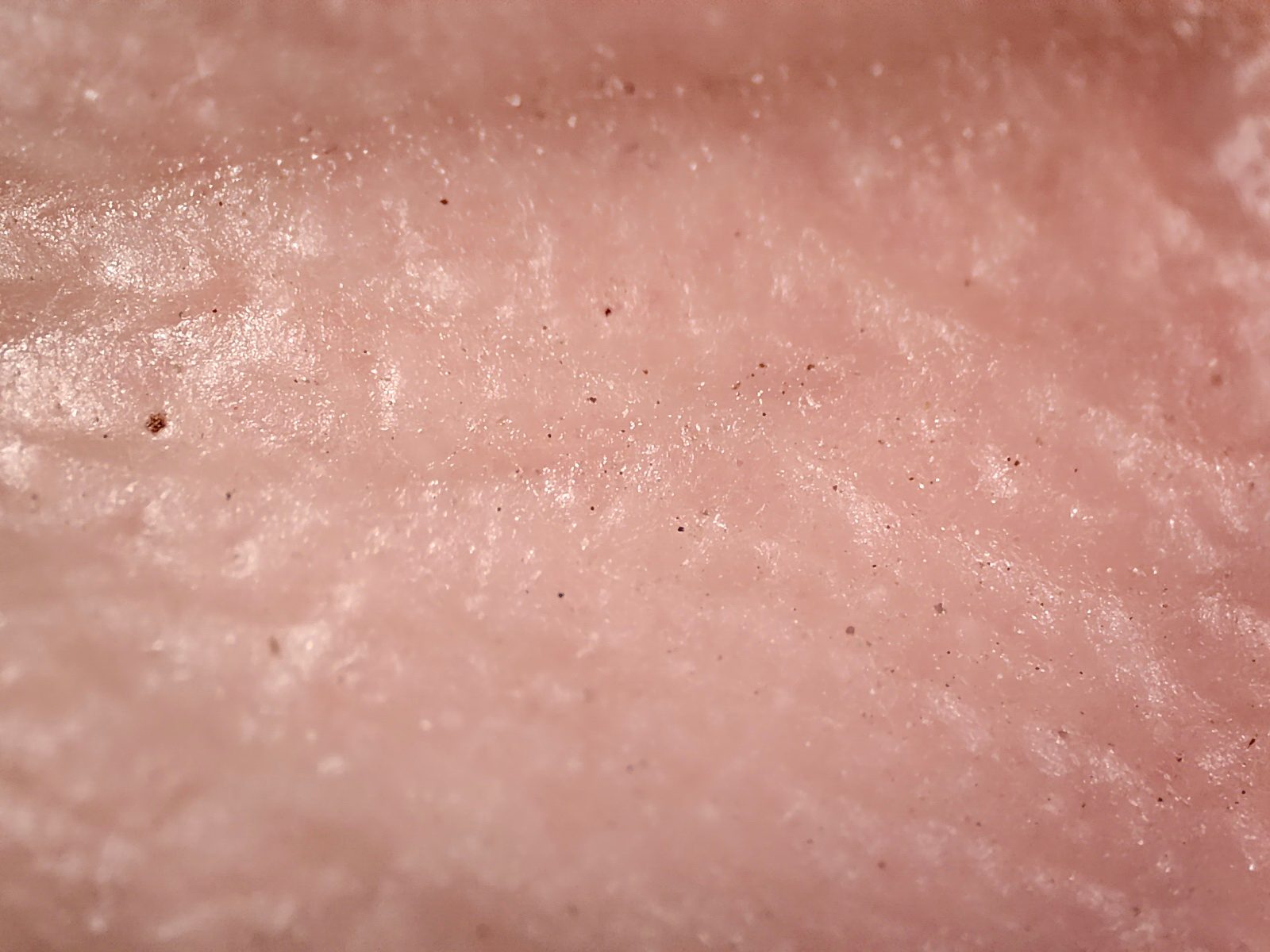 Macro view of a dirty palm before washing hands using soap photographed with the Realme GT 2 Pro's microscope camera.