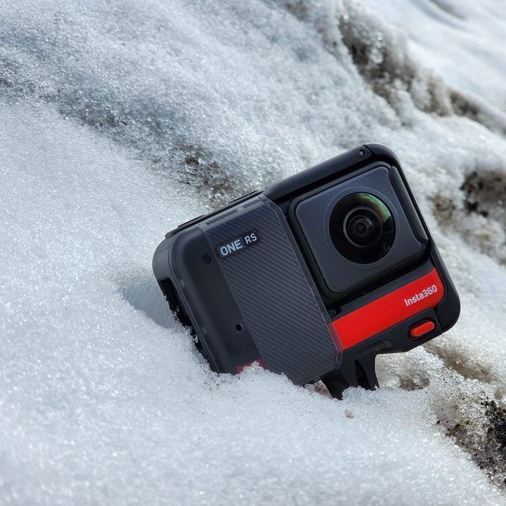 The Insta360 One RS with 360 lens mod in a snow bank.