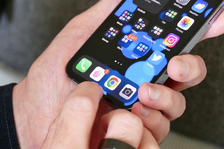 The iPhone's Dock shown on an iPhone 13 Pro.