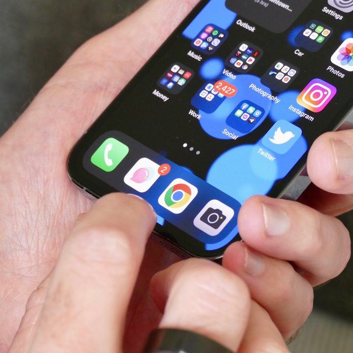 The iPhone's Dock shown on an iPhone 13 Pro.