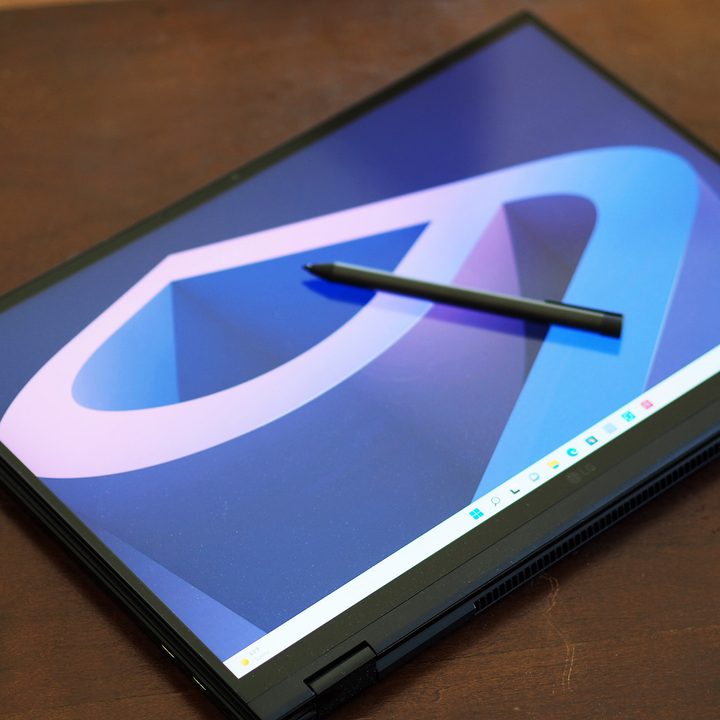 The LG gram 16 2-in-1 sits like a tablet with a stylus on top.