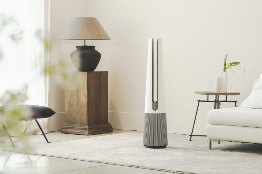 The LG PuriCare AeroTower sits in the center of a room and cools the entire space.