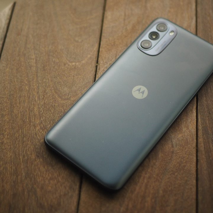 The Moto G 5G smartphone sitting face down on a table