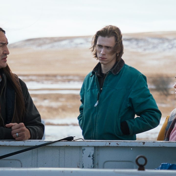 Mukki looks at Cal and Erin in Montana Story.