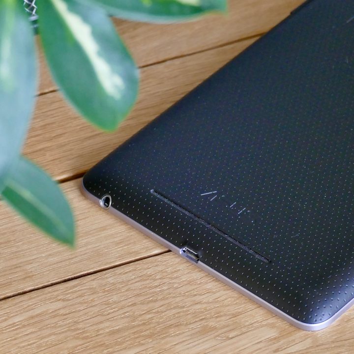 The charging and headphone ports on the Nexus 7 tablet.
