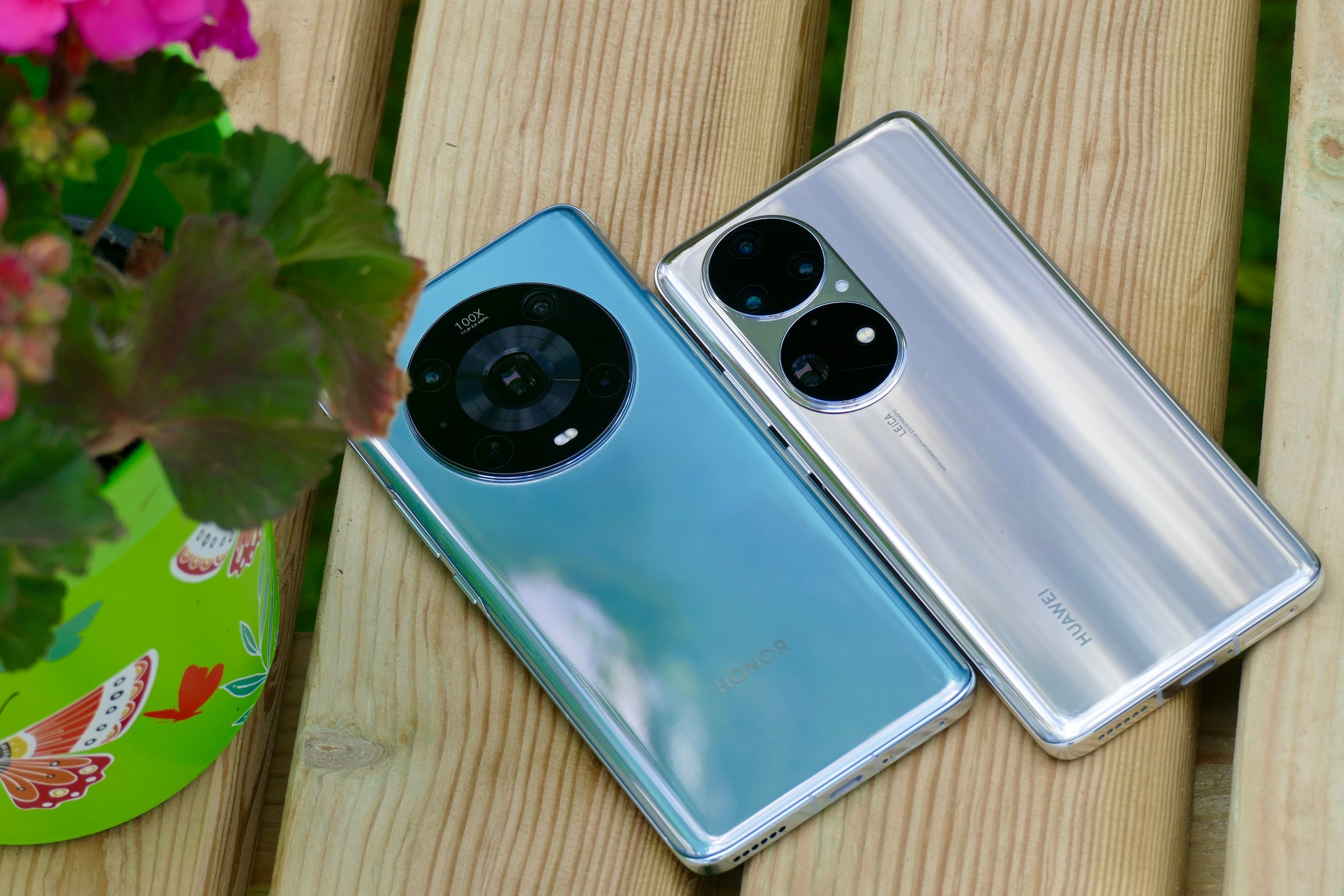 Huawei P50 Pro and Honor Magic4 Pro seen from the back.