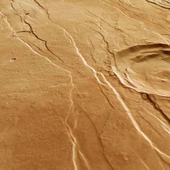 This oblique perspective view of Tantalus Fossae on Mars was generated from the digital terrain model and the nadir and colour channels of the High Resolution Stereo Camera on ESA’s Mars Express.
