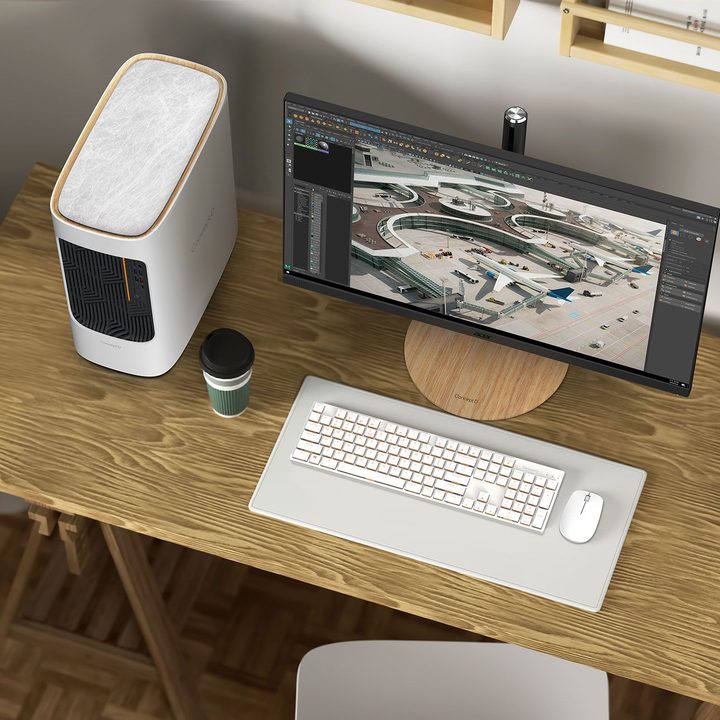 Acer ConceptD 500 desktop on a desk alongside a monitor and keyboard.