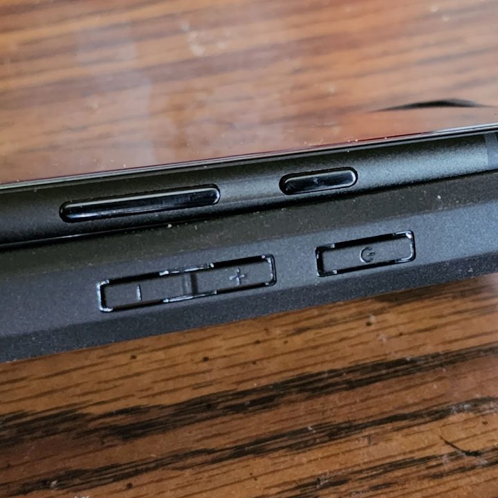 Pixel 6 on top of a Pixel 6A case shonig button placement.