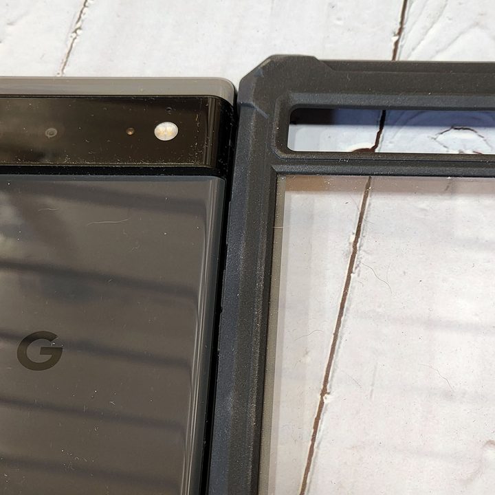 Pixel 6 next to a Pixel 6A case.