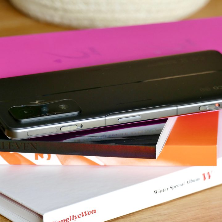 Poco F4 GT from the side showing its buttons and slider controls.