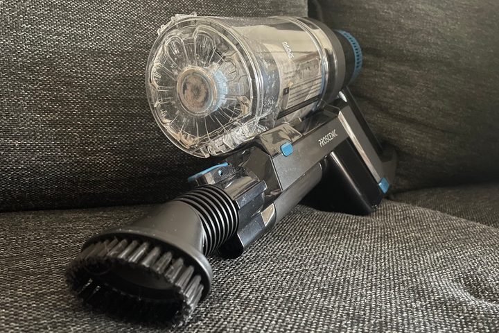 The Proscenic P11 on a couch.