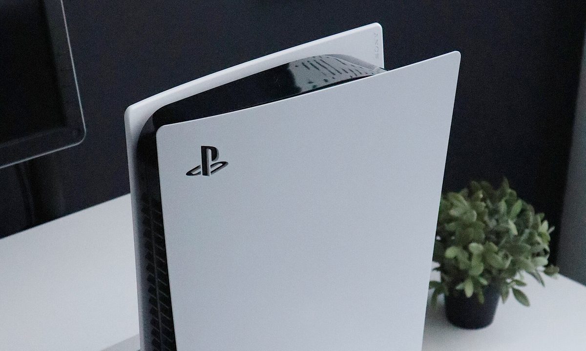 The Playstation 5 system standing upright.