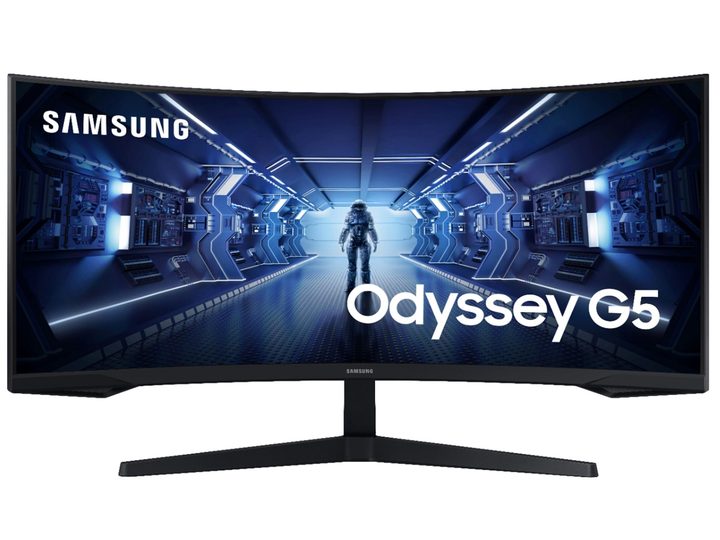The Samsung G5 Odyssey curved gaming monitor with an astronaut in a spaceship on the screen.