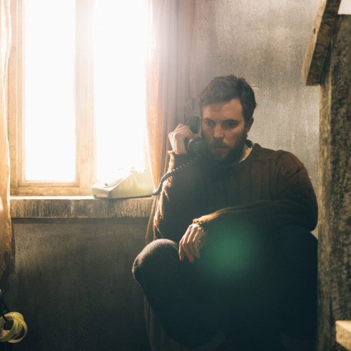 Eric sits near a window in Shepherd.