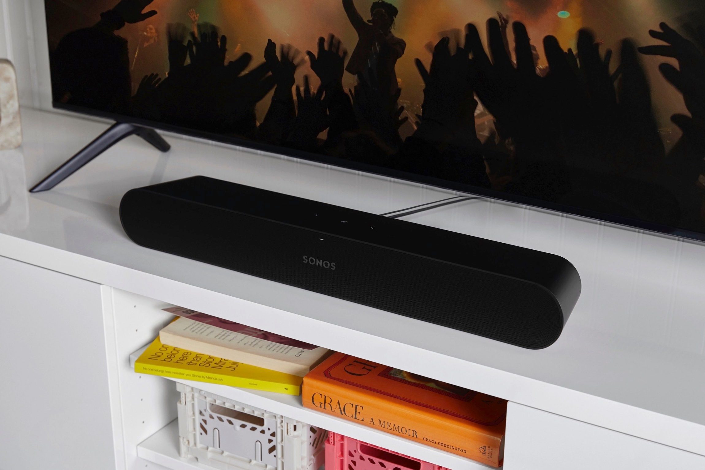 A leaked publicity photo of a new Sonos soundbar in black seen under a TV.