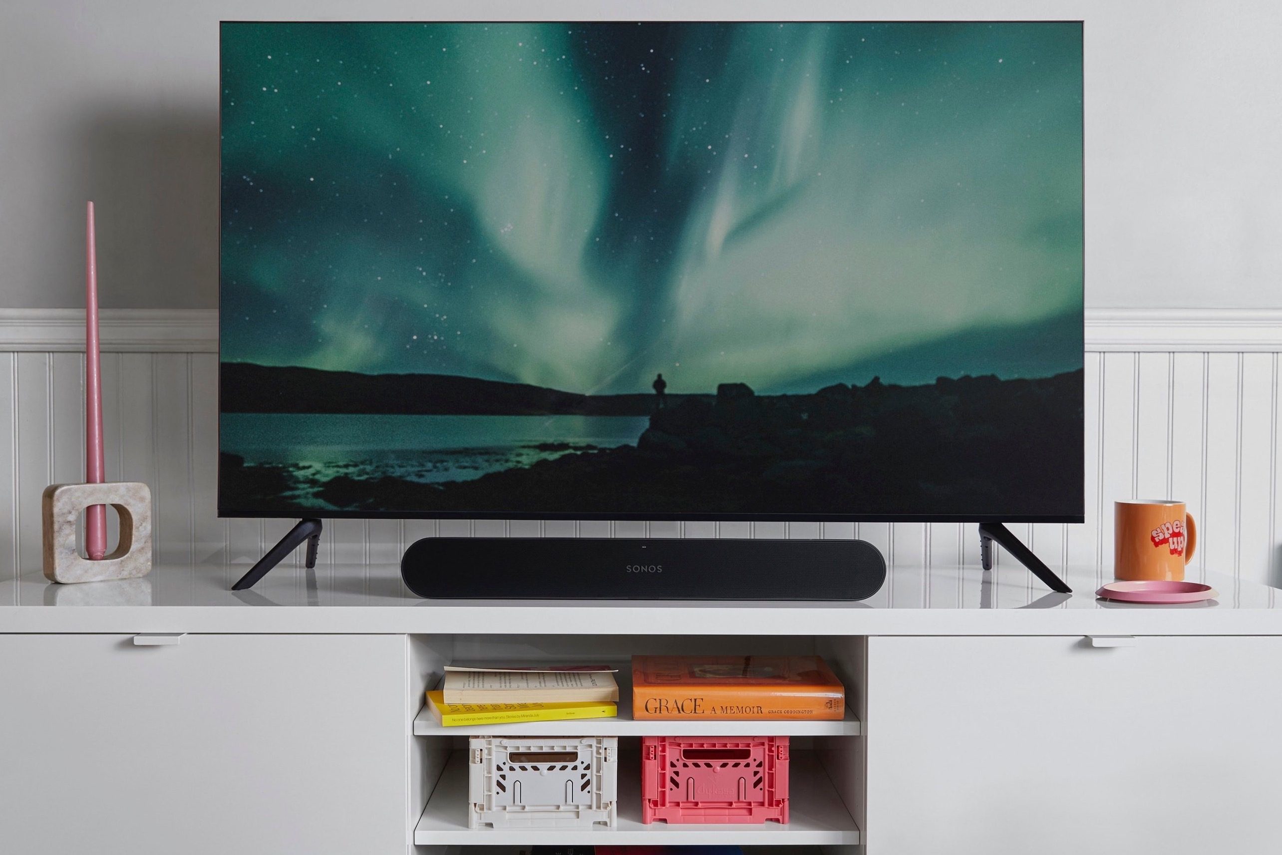 A leaked publicity photo of a new Sonos soundbar in black seen under a TV.