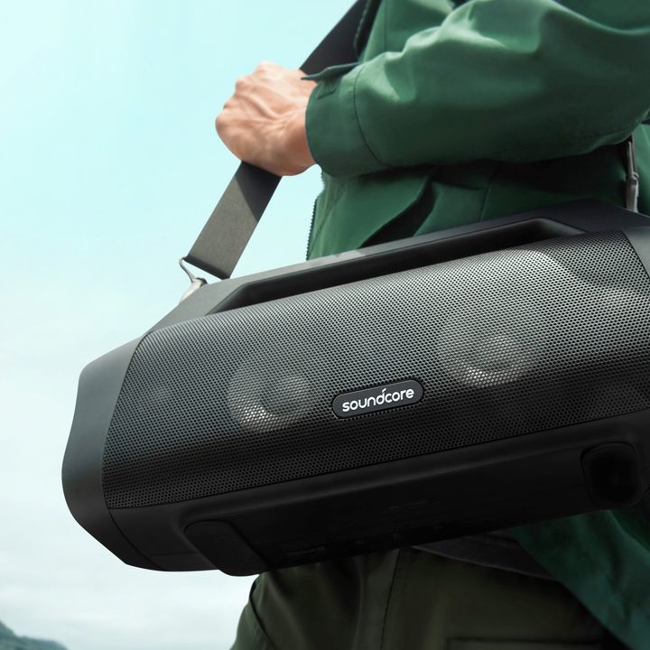 Soundcore Motion Boom Plus being shoulder-carried.
