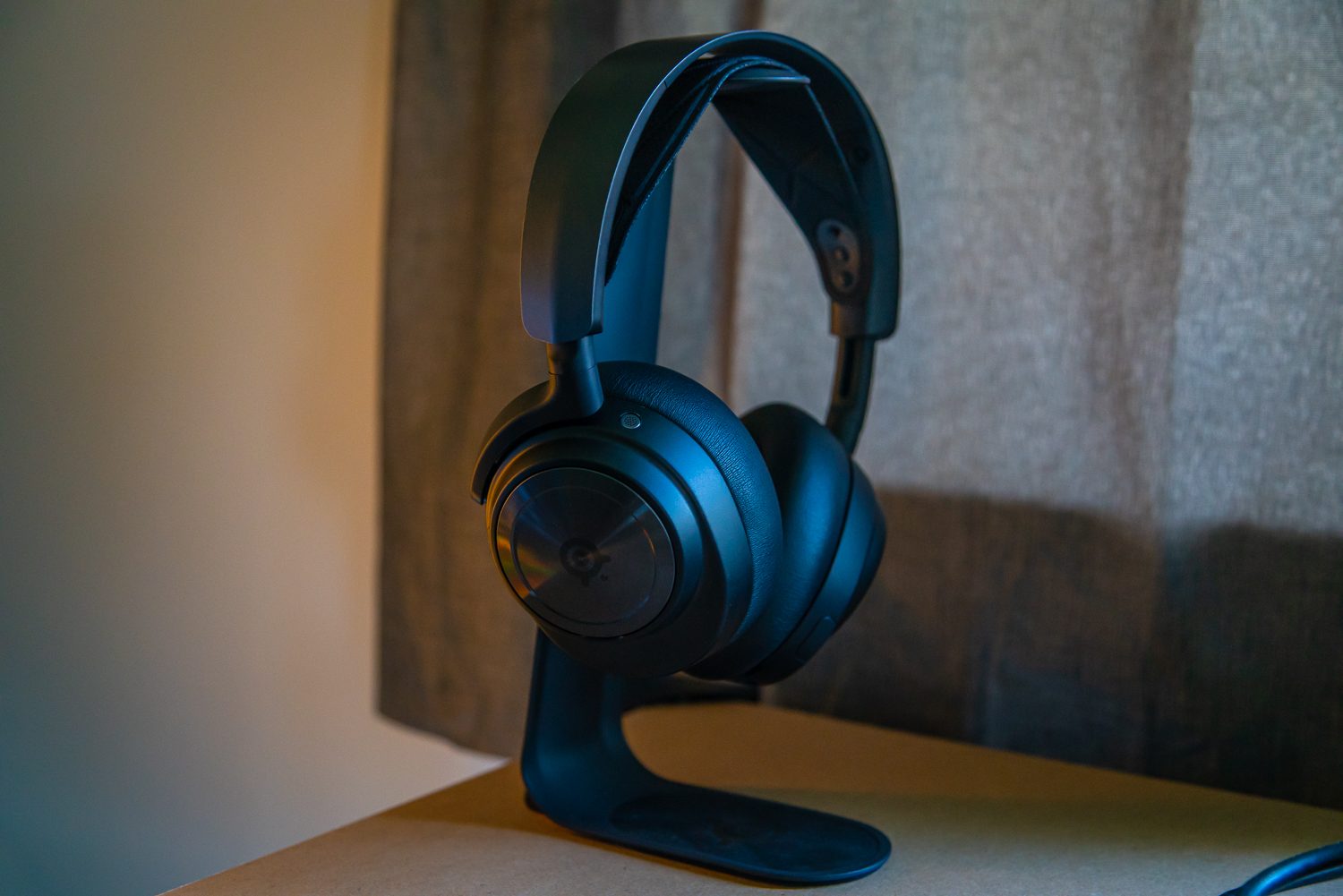 Steelseries Arctis Nova Pro headset sitting on a stand.