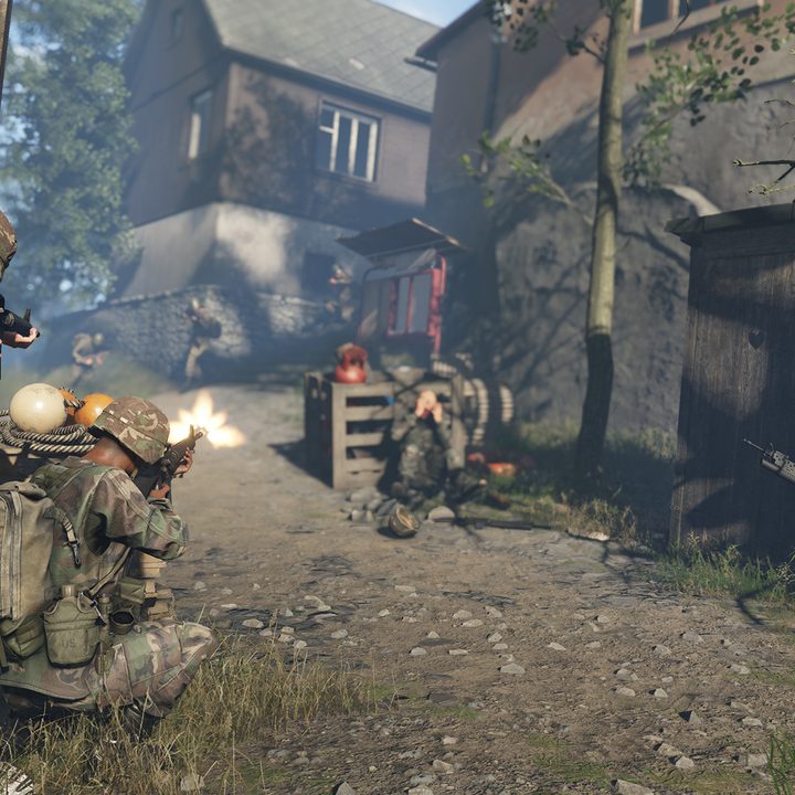 Soldiers engage in a shootout in Arma Reforger.